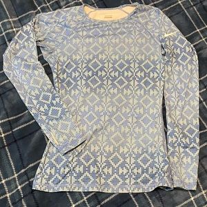 Nike long sleeve dri-fit running shirt with thumb holes. Size small.